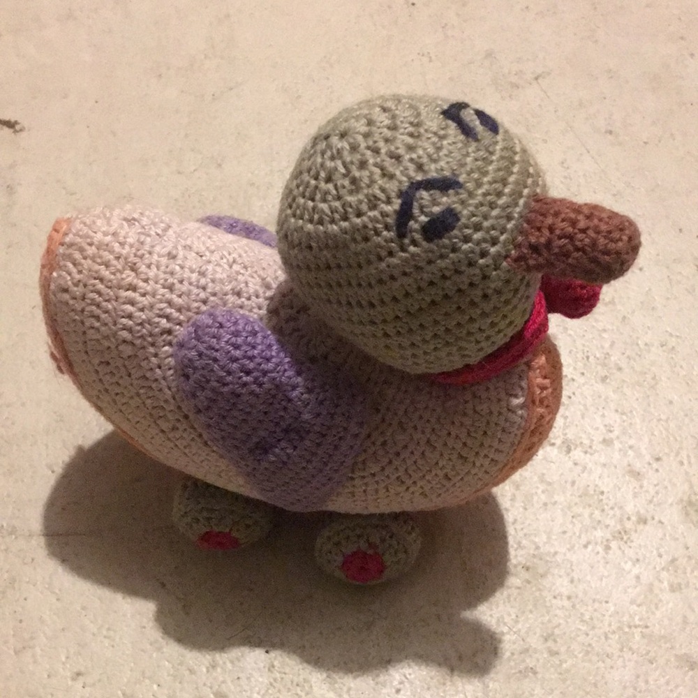 Handcrafted Crochet Duck Toy with Purple and Brown Details